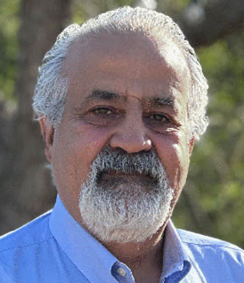 A man smiles for the camera