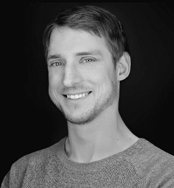 man smiles for camera