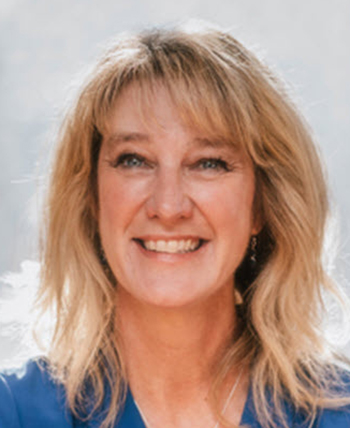 woman smiles for the camera