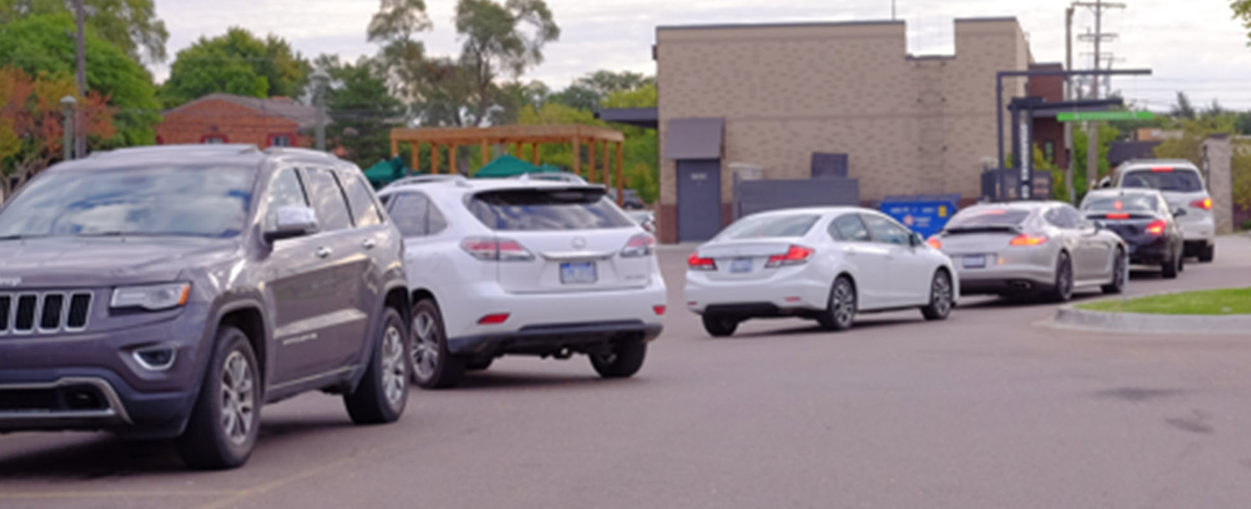 a long line at a drive-thru a long line at a drive-thru