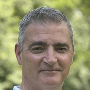 a man smiles for the camera