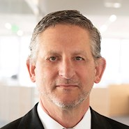 man smiles for the camera