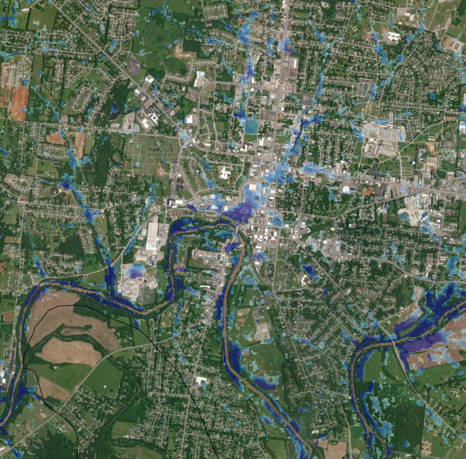 The aerial image depicts areas of lighter and darker blue that represent the depth of flash flooding in a community in Tennessee.