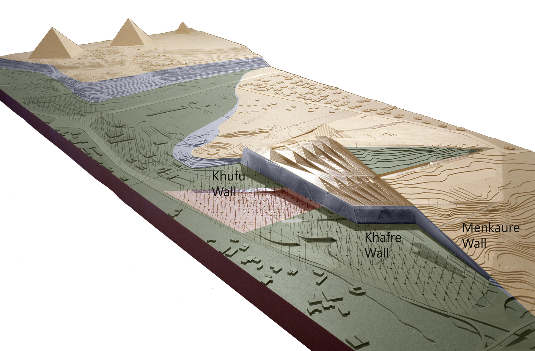 The image shows a design model at the site of a museum in the Egyptian desert.