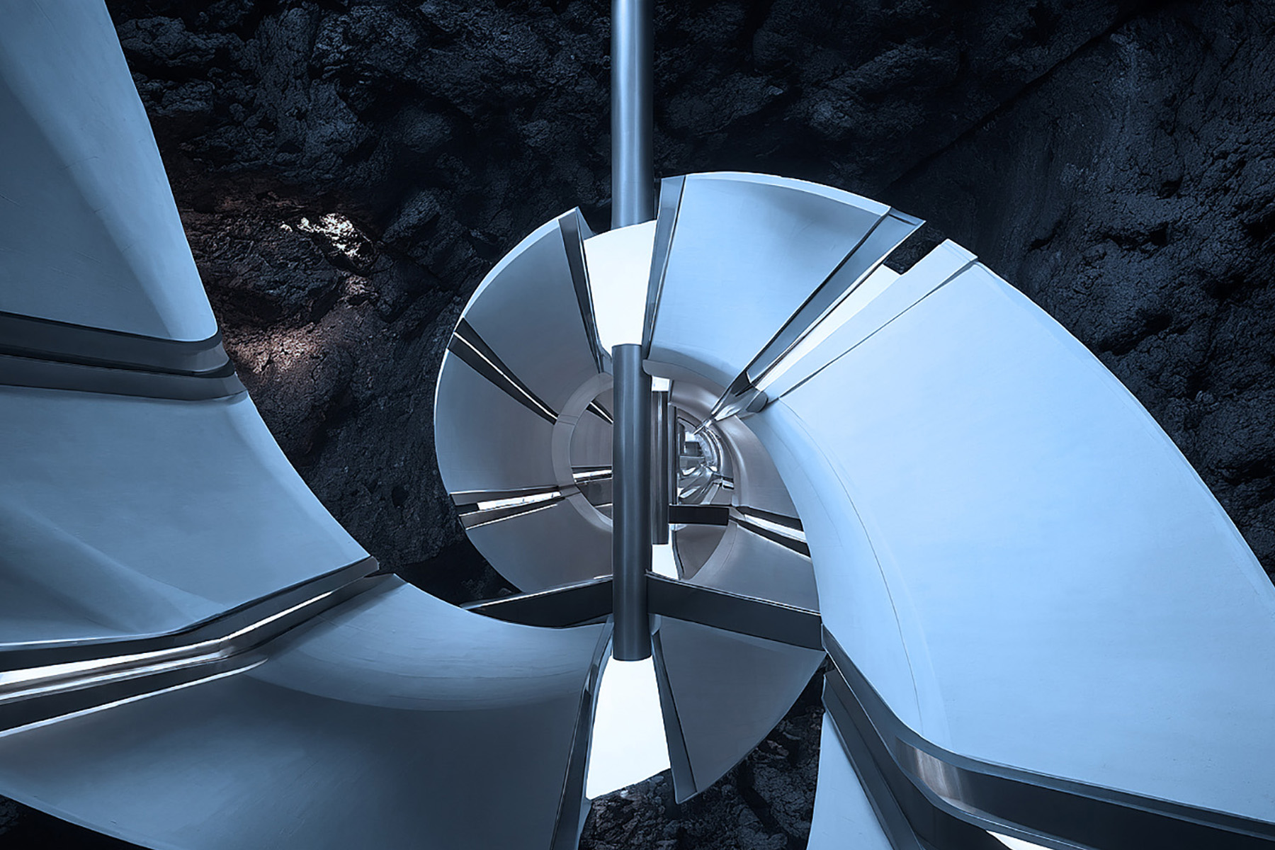 A rendering shows a closeup of the inflatable helices inside the lava tube, wrapped around one of the elevator shafts to the surface. 