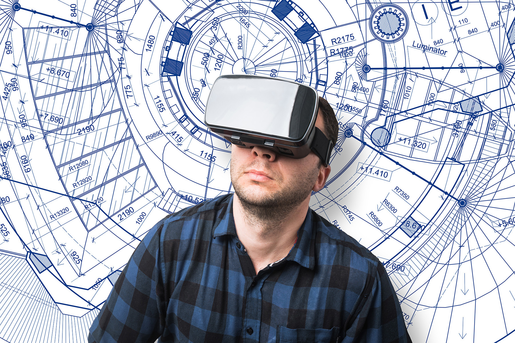 A man wearing a blue and black checkered button-down shirt wears a black augmented reality headset. In the background is a blue and white sketch. 
