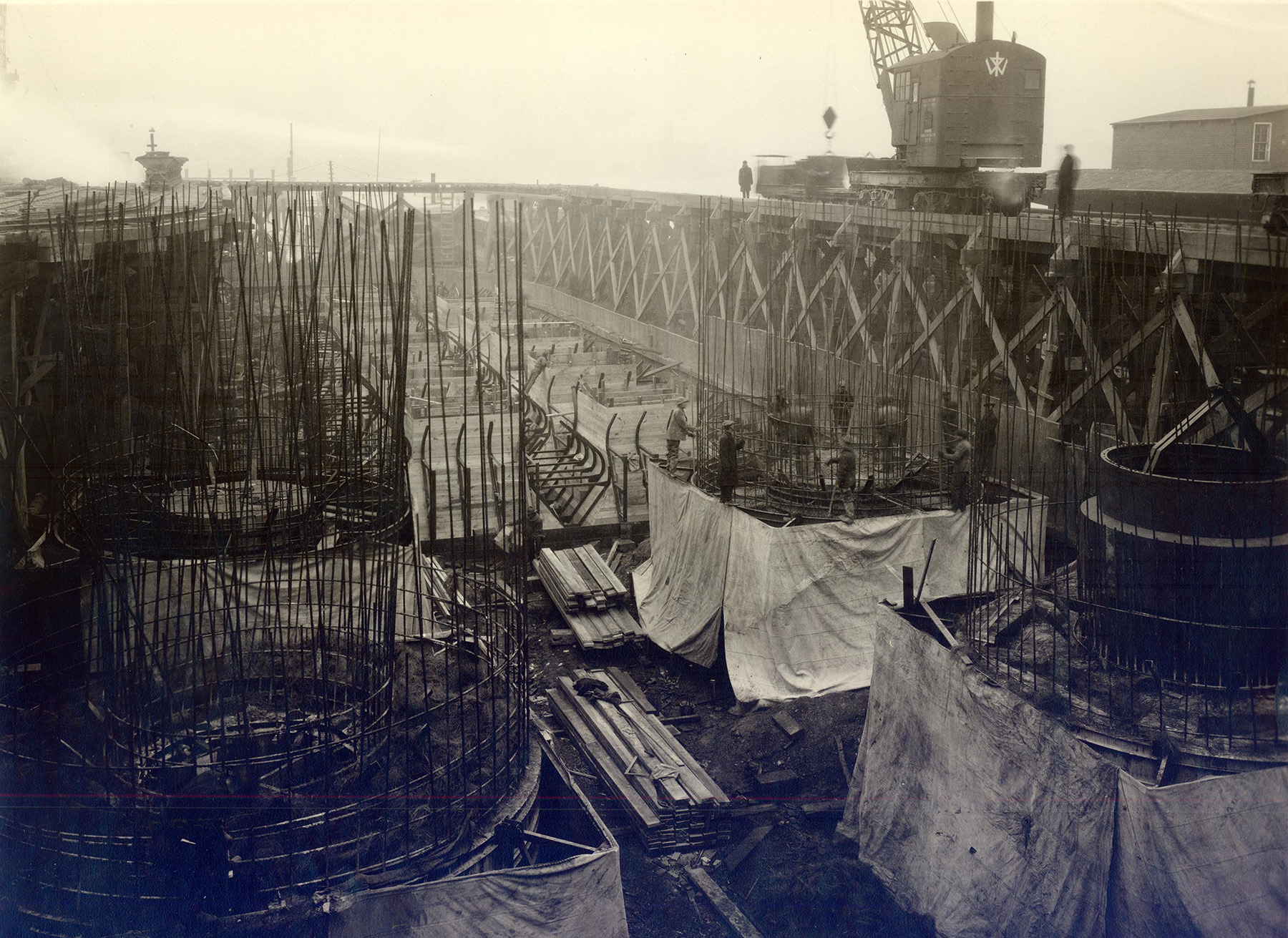 Picture shows rectangular and circular steel structures lined up.