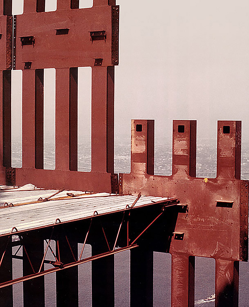 Photograph shows steel sections attached to metal decking. 