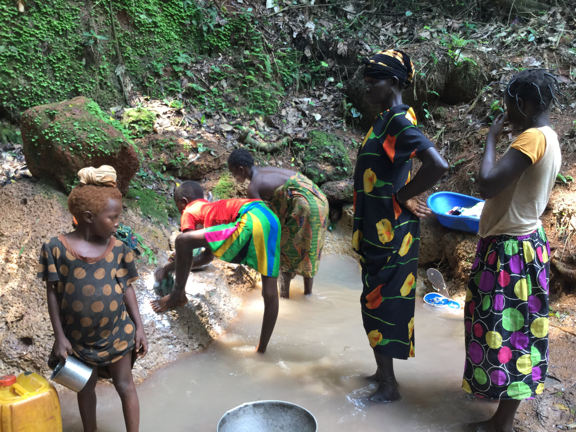Children collect water from local springs.