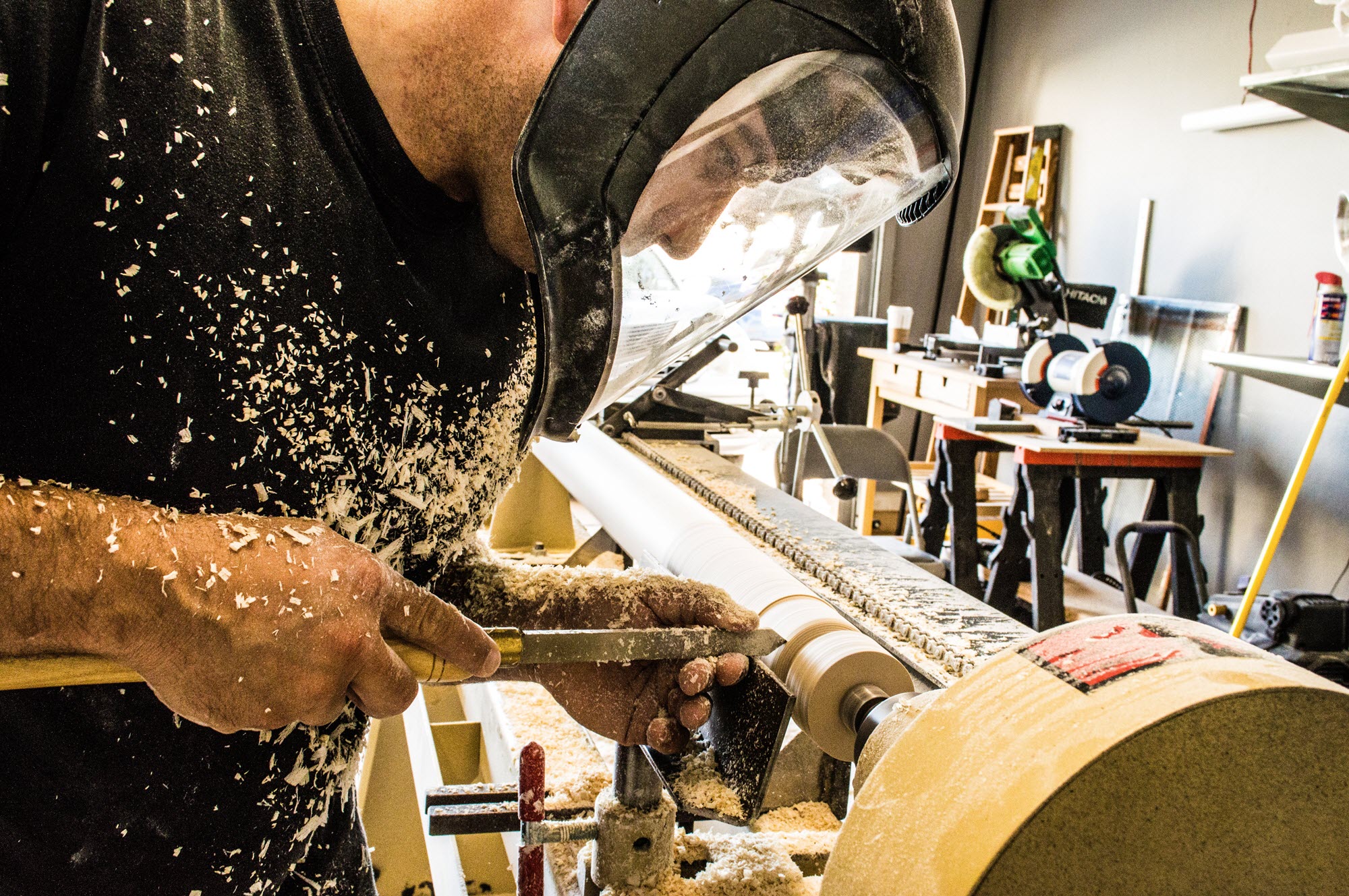 photo of someone working on a table saw