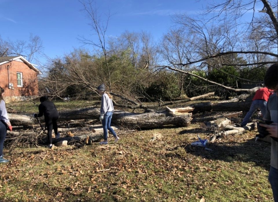 photo of WKU students assisting with tornado cleanup