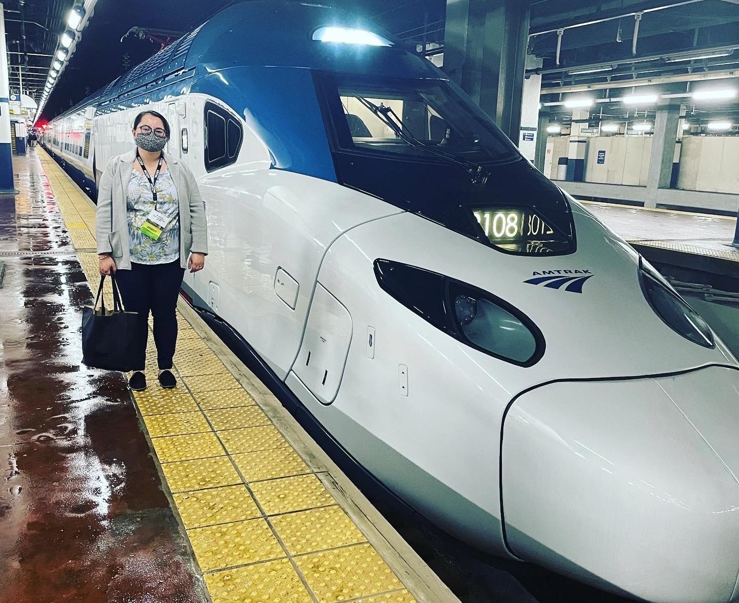 photo of Assunta Daprano next to a train