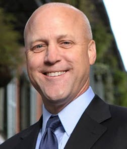 headshot of Mitch Landrieu