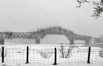 photo of bridge under construction in winter