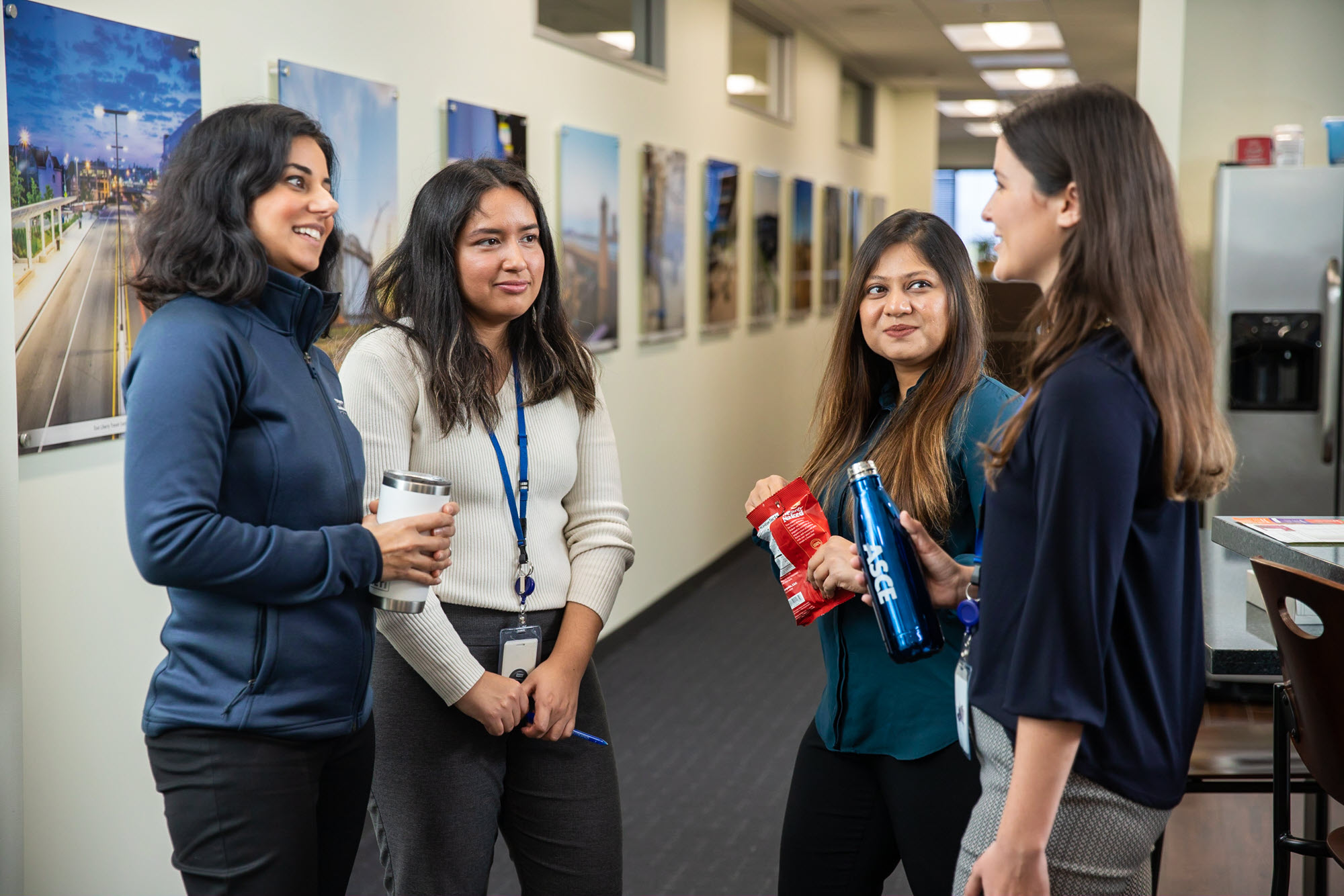 photo of civil engineers talking in the office