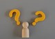 Wooden figure and question mark symbols