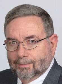 headshot of Pegues