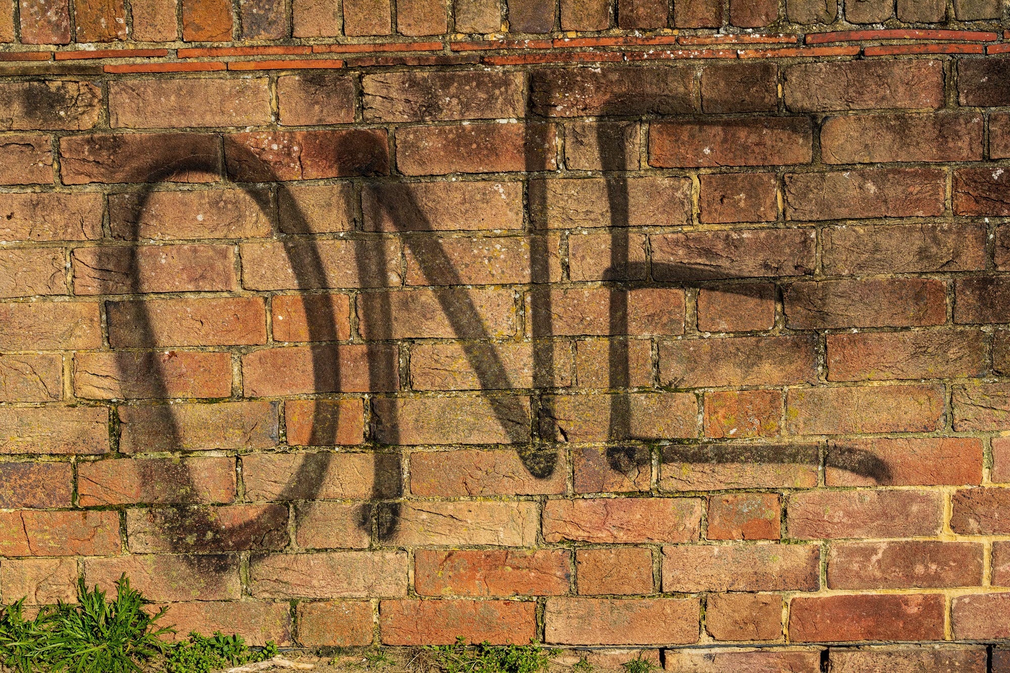 photo of the word one painted on a wall
