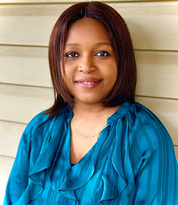 headshot of Tolu Sanni