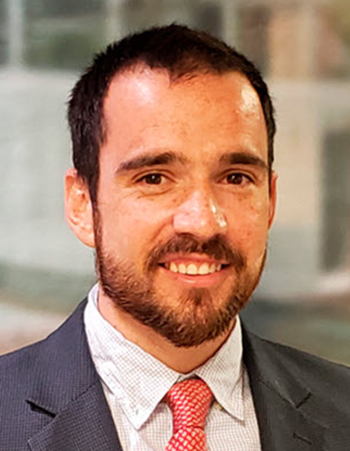 man smiles for the camera