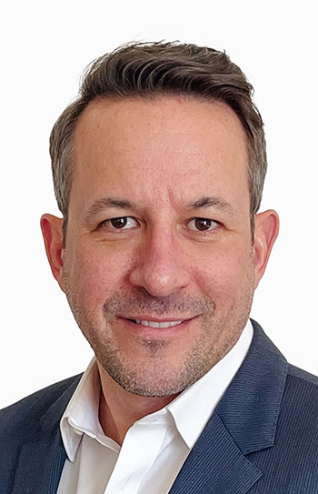 man smiles for camera