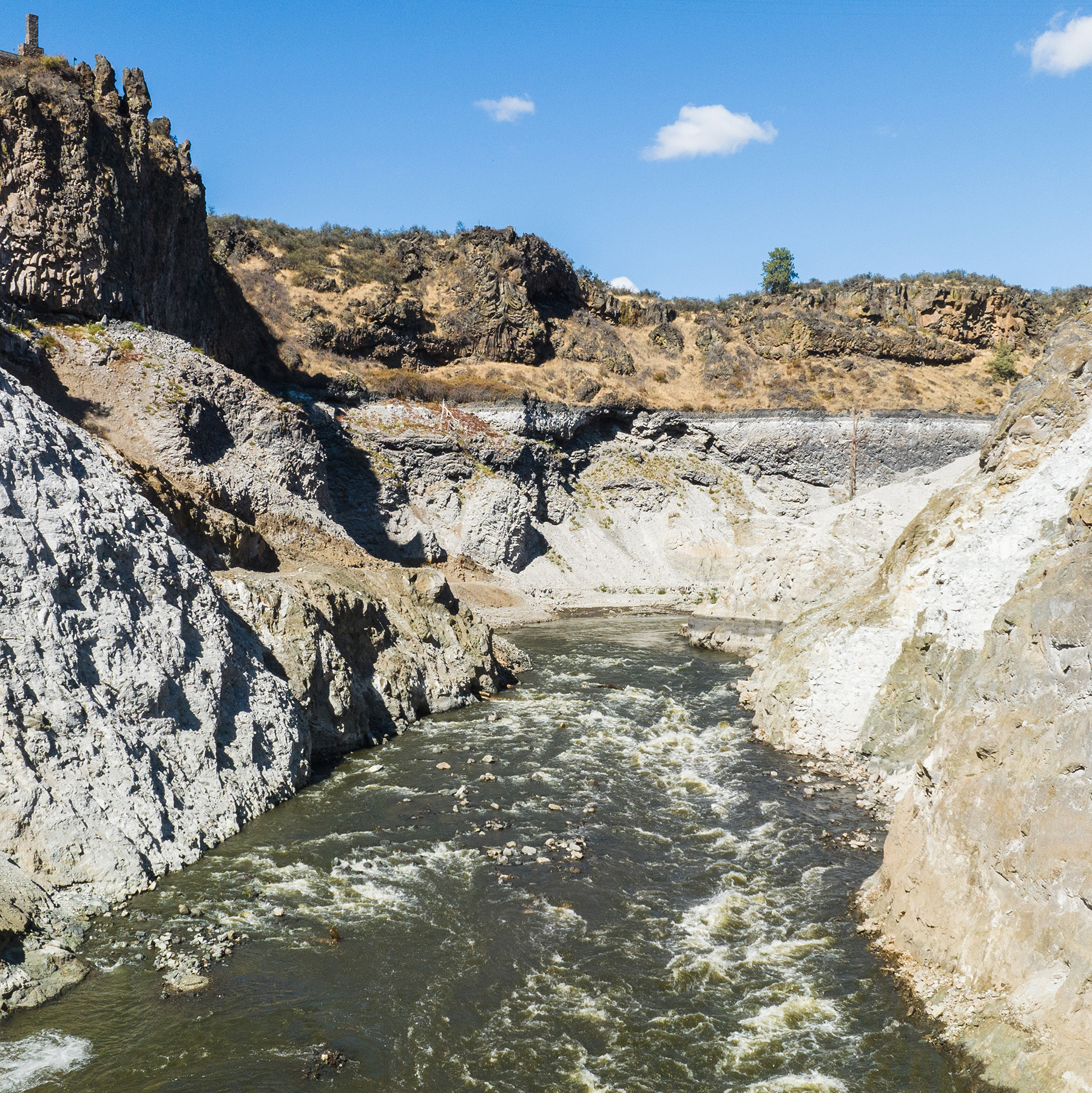 a river flows freely where once a dam was in place