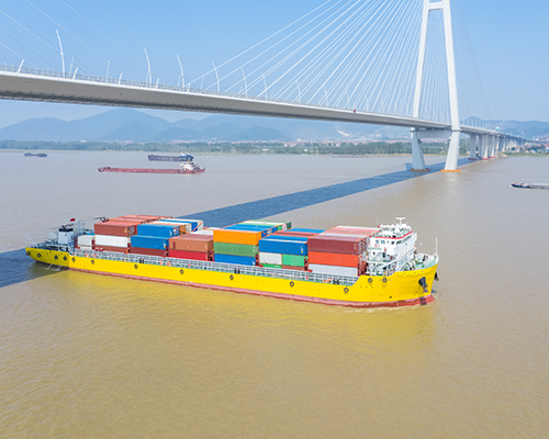 Container ship approaching bridge