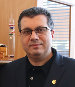 Headshot of Al-Hussein