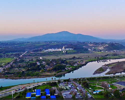 Aerial view of Aconcagua river surrounded by vegetation and Mauco Hill in background, Valparaiso, Chile