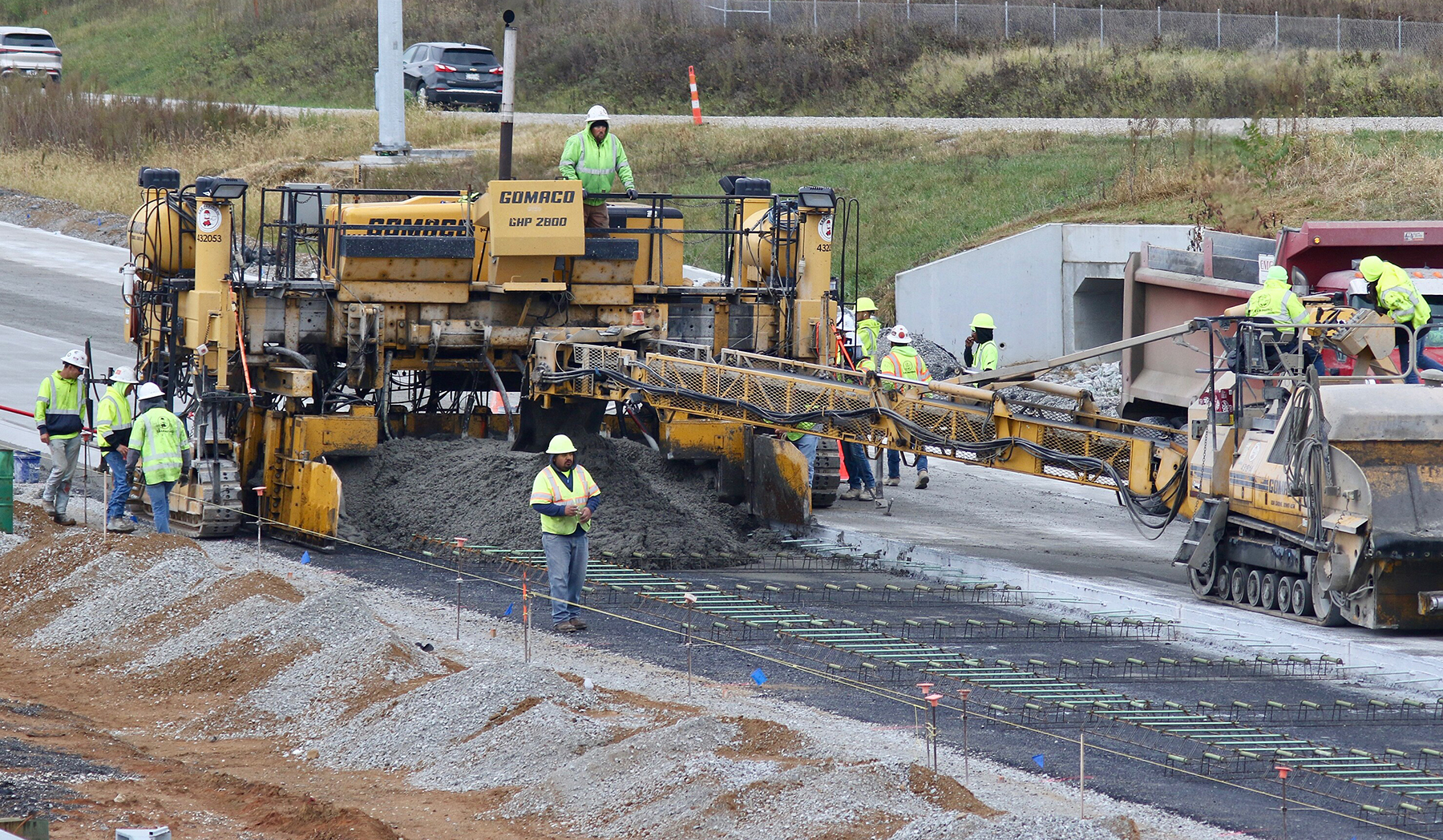 a crew works on a road project a crew works on a road project