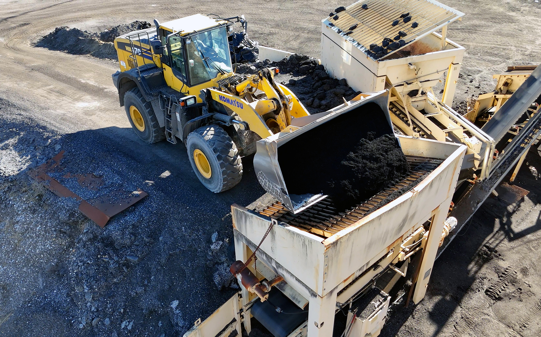 heavy machinery prepares the asphalt heavy machinery prepares the asphalt