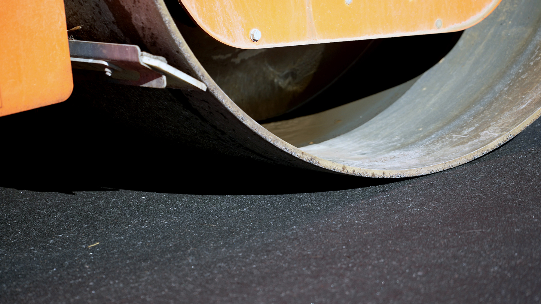 a closeup view of the asphalt a closeup view of the asphalt