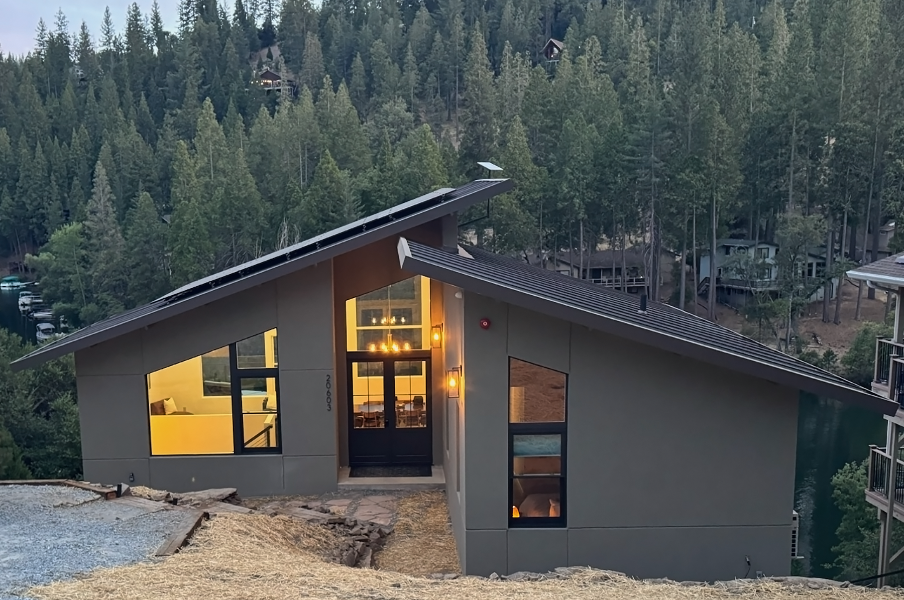 a home sits in a wooded area a home sits in a wooded area