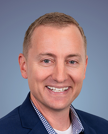 man smiles for camera