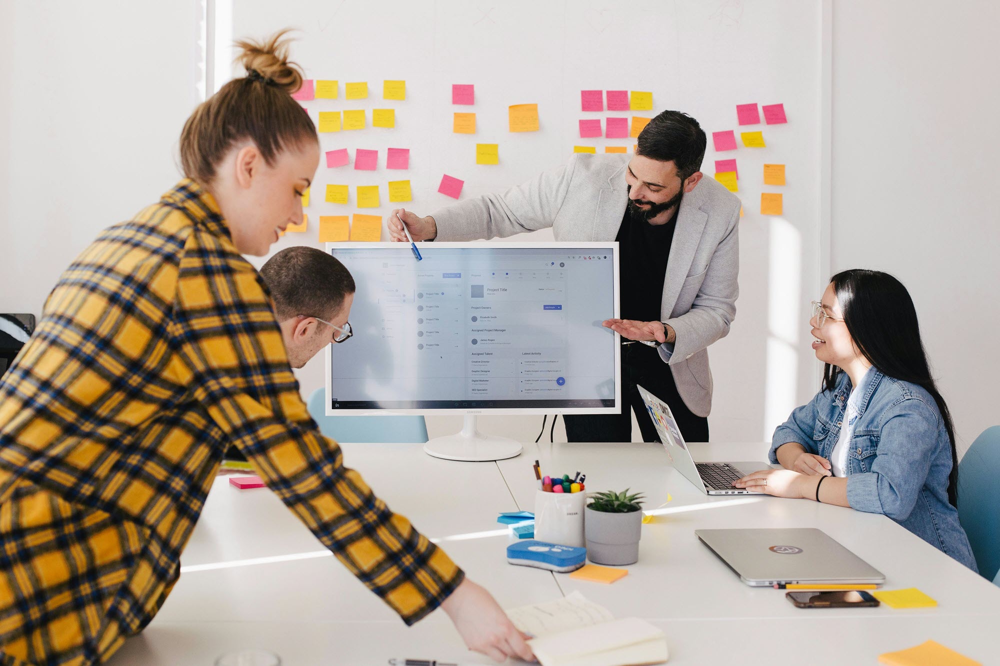 Photo of people problem solving at work