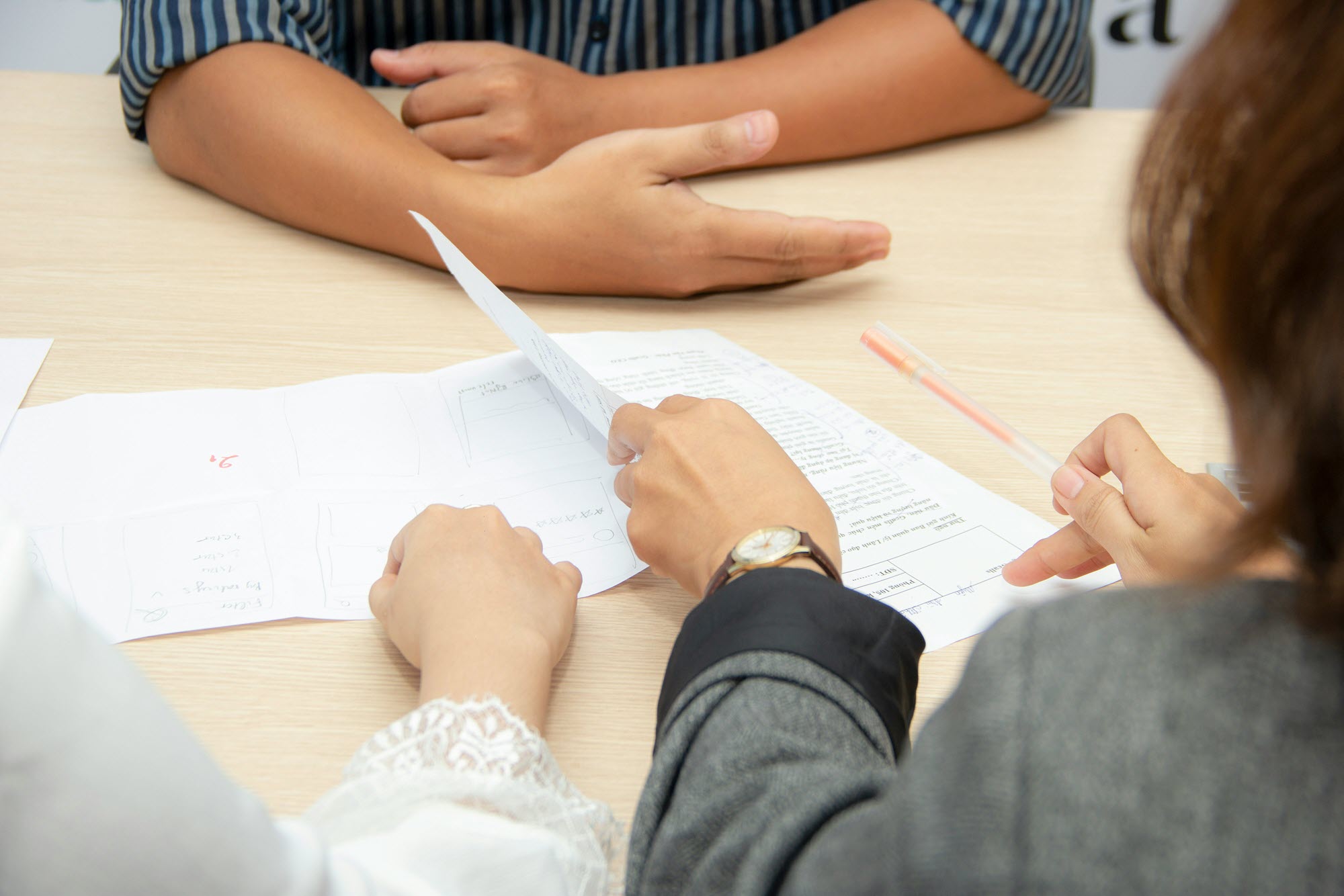 Photo of people workshopping a document