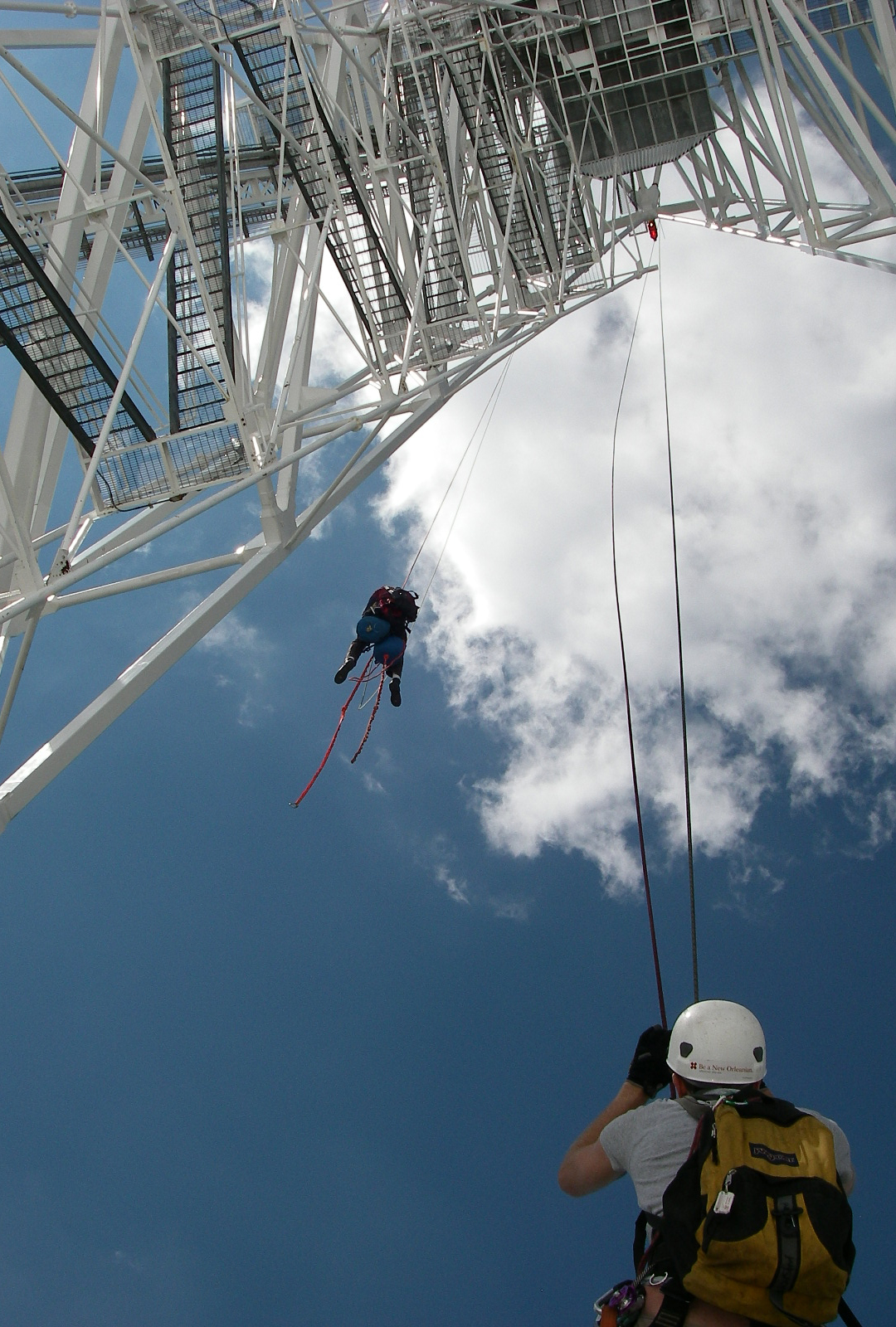 workers rappel down the giant telescope workers rappel down the giant telescope