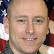 man smiles for camera