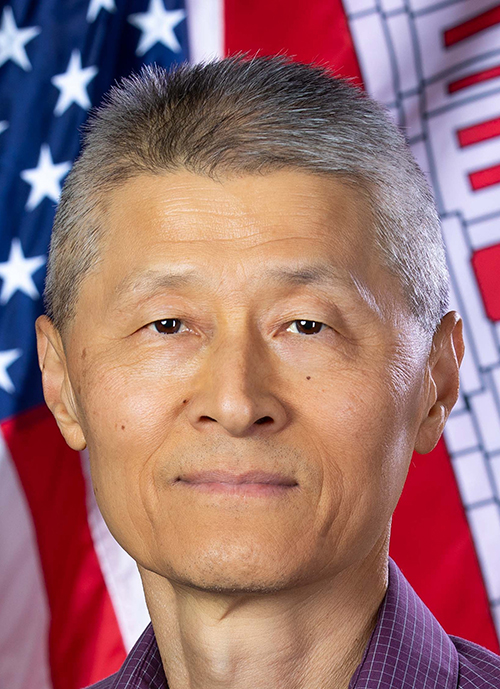 man smiles for camera