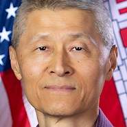 man smiles for camera