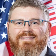 man smiles for camera