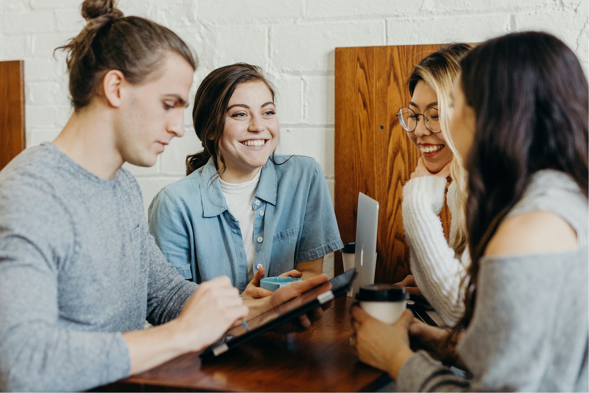 Photo of young people meeting in a workplace