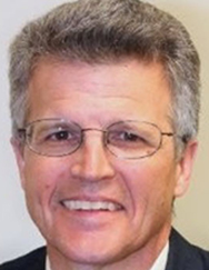 man smiles for the camera man smiles for the camera