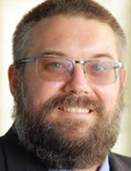 man smiles for the camera man smiles for the camera