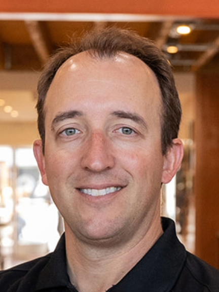 man smiles for the camera