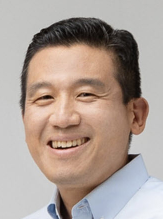 a man smiles for the camera