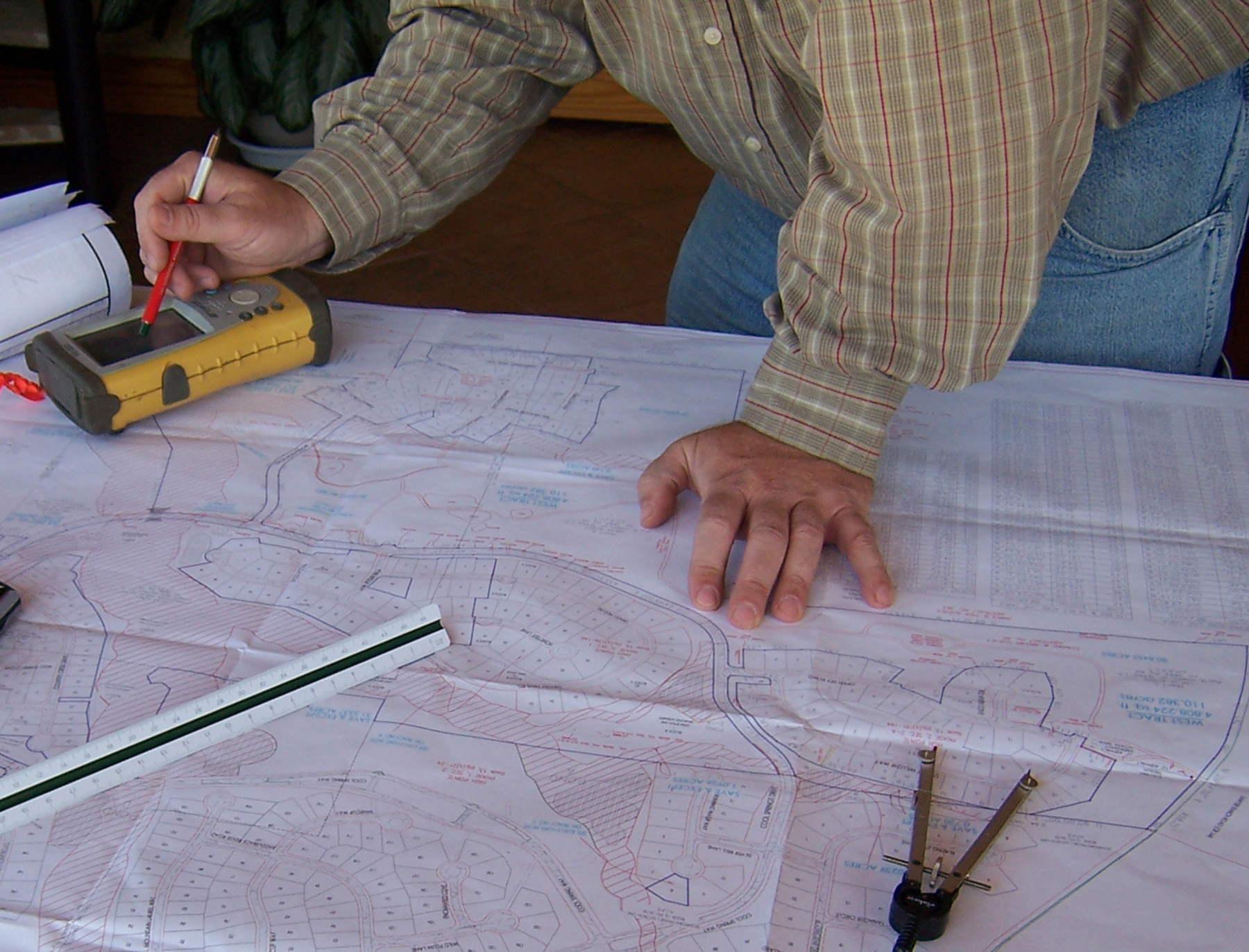 a civil engineer works with tools of the trade