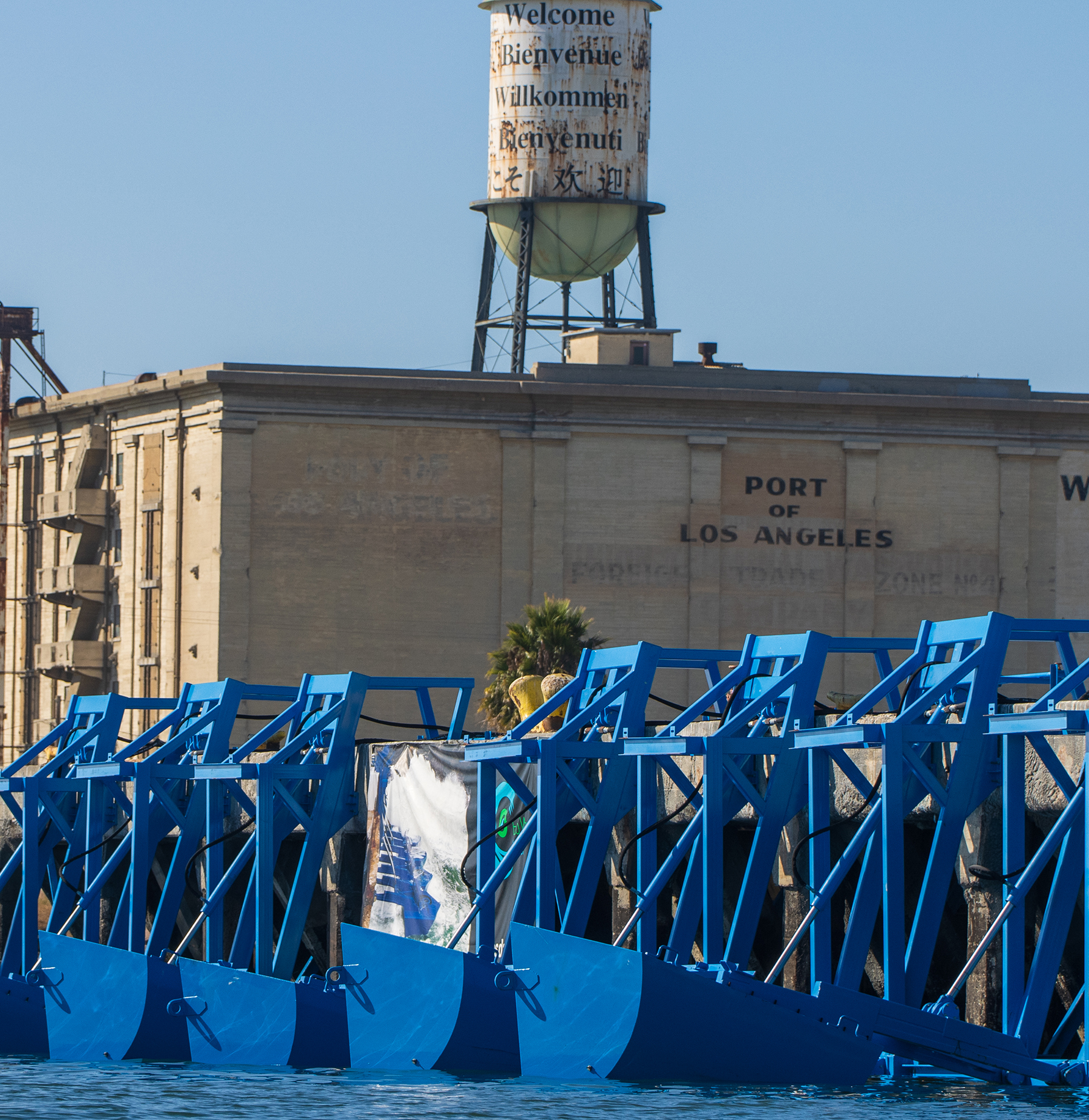 the shore-based energy project is shown with an industrial-type building in the background
