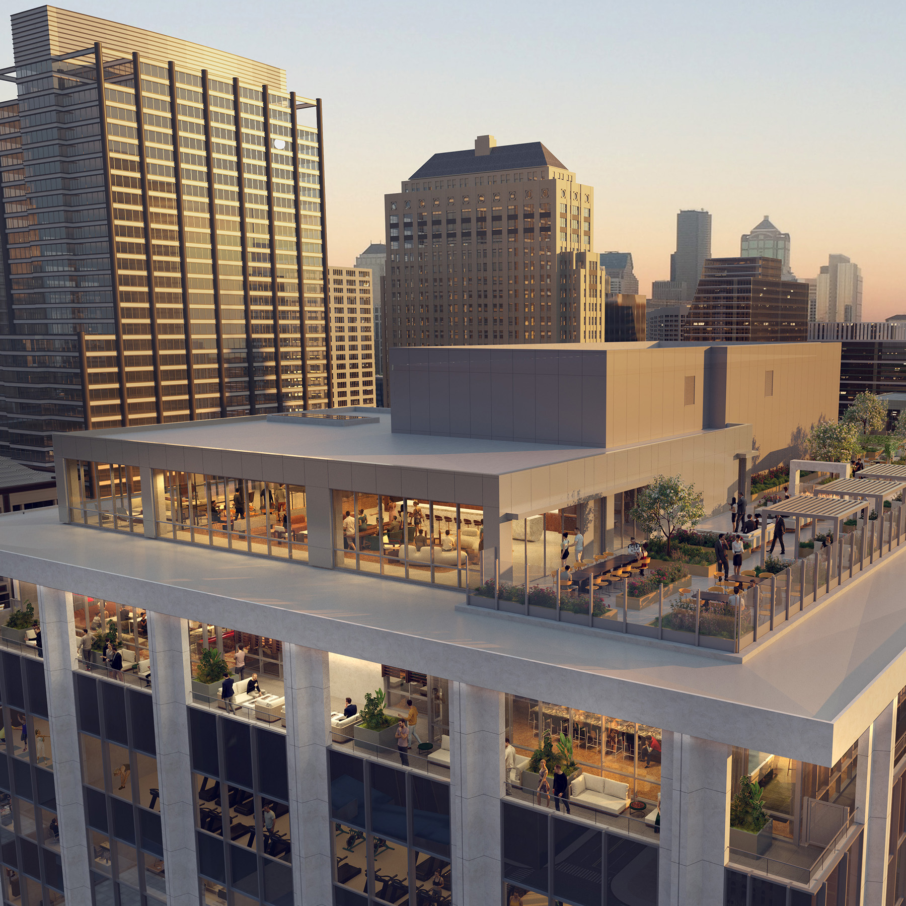 aerial image shows mechanical areas on the roof of a building with a skyline of buildings in the background