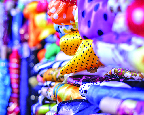 Fabric rolls in a variety of colors and patterns